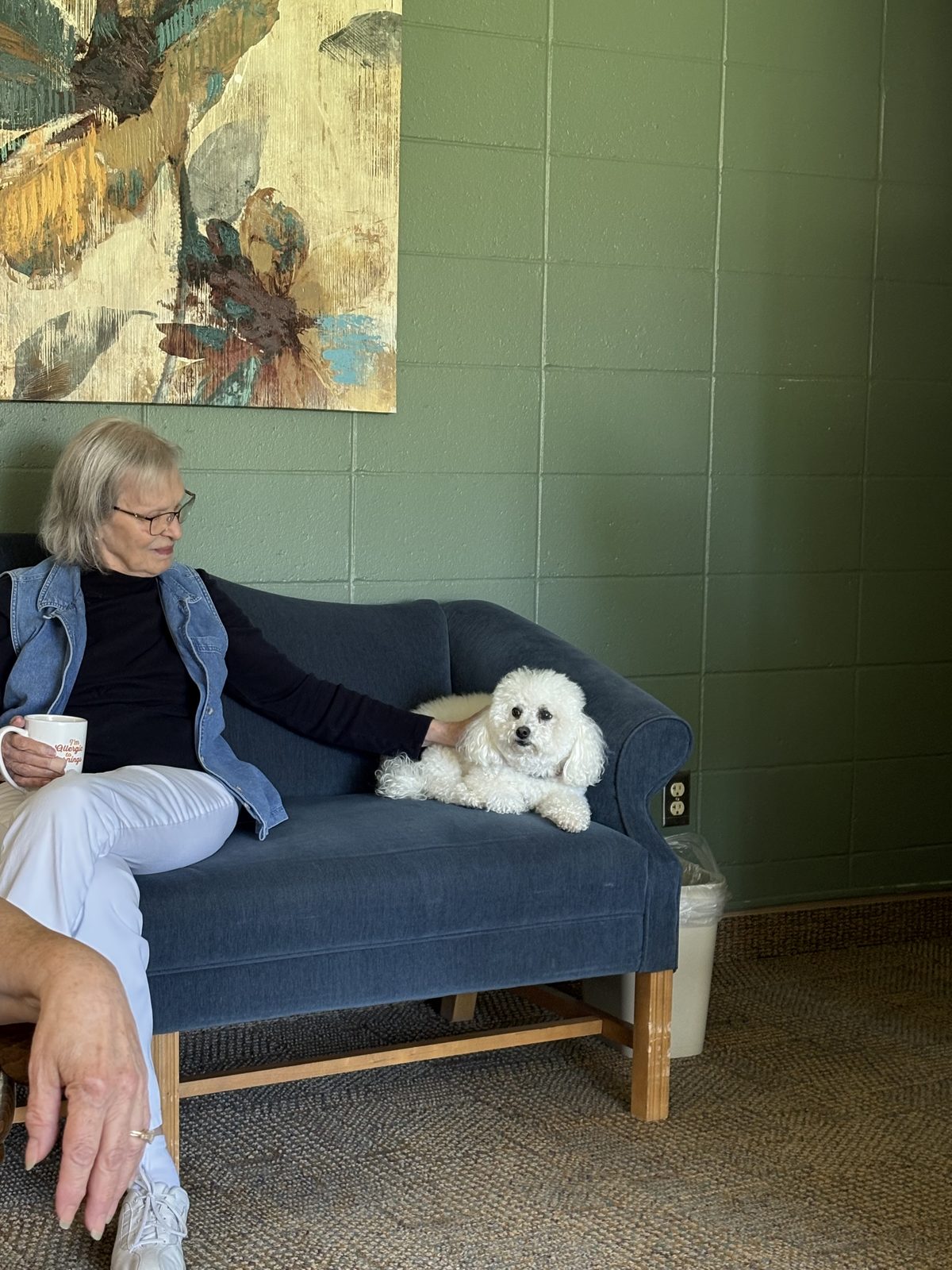 A quiet moment with a furry friend in one of our sitting areas