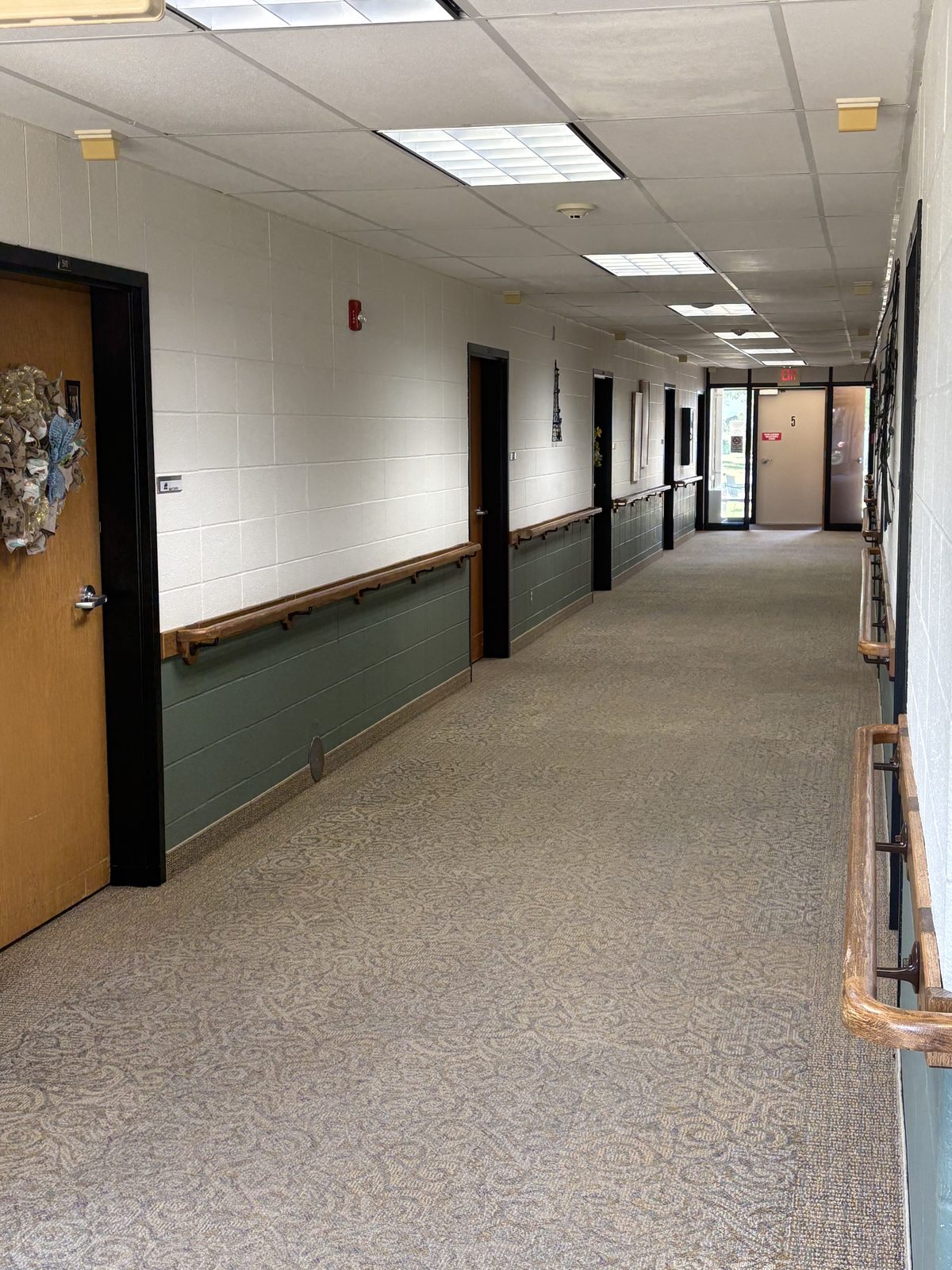 A bright hallway with handrails